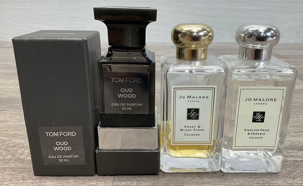 Lot 155: * A Trio of Assorted Part Used Fragrances including Tom Ford Oud Wood and Jo Malone London Colognes