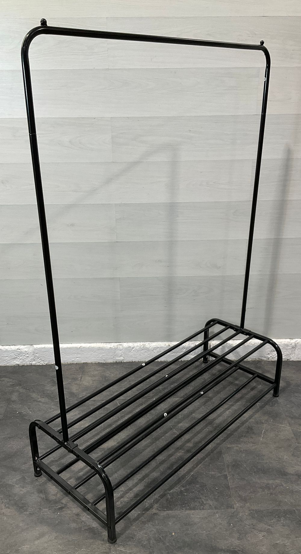 Lot 160: * A Black Tubular Metal Free Standing Garment Rack with Integrated Two Tier Storage