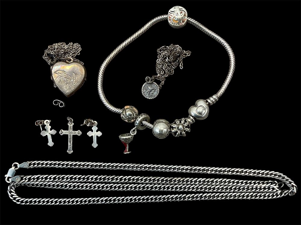 Lot 11: * A Collection of Assorted Silver Jewellery including a Heart Locket and Charm Bracelet, Total Approx. Weight 53.2g