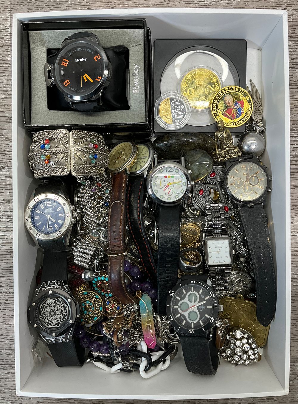 Lot 12: * A Tray Containing An Assortment of Household Goods including Henley Wristwatch and Royal Commemoratives