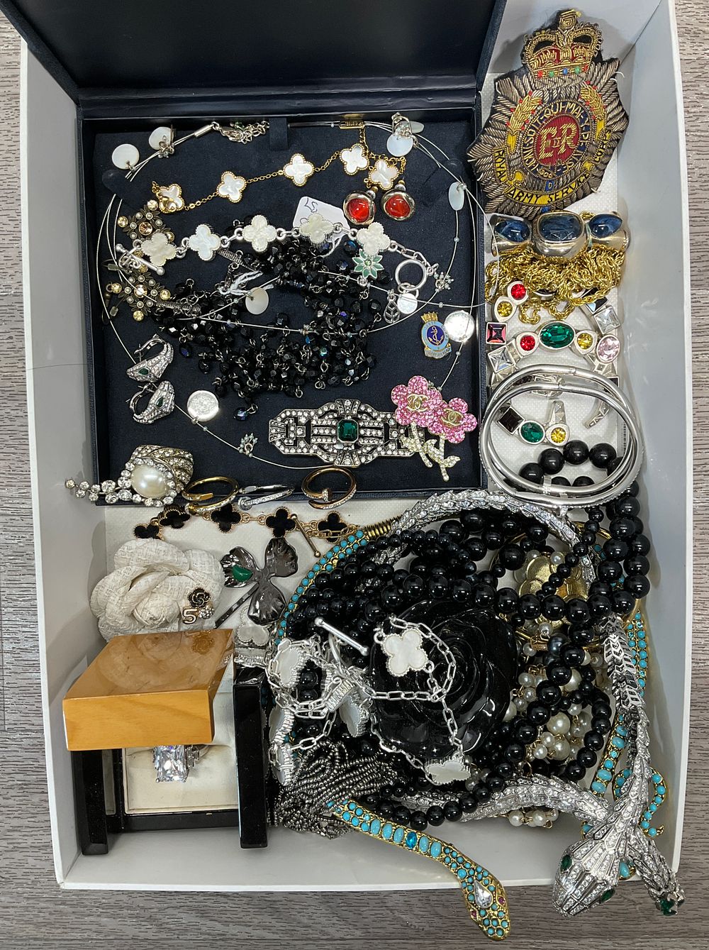 Lot 15: * A Tray Containing An Assortment of Costume Jewellery and Militaria including A Royal Army Service Corps Badge