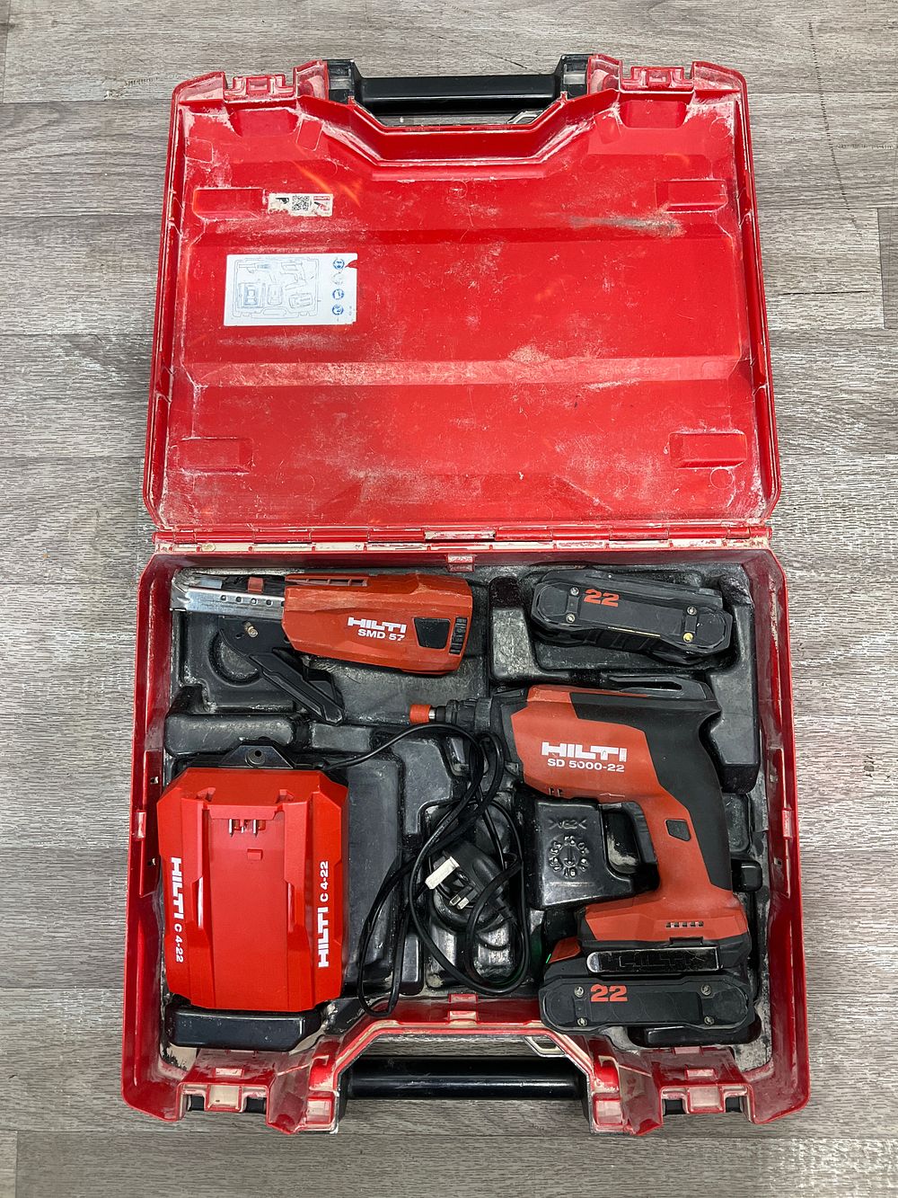Lot 31: * Hilti SD 5000-22 Cordless Drywall Screwdriver with SMD 57 Magazine, Batteries and Charger in Carry Case