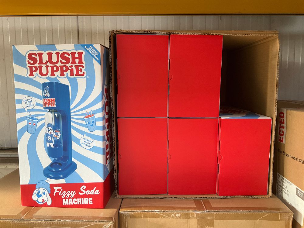 Lot 50: A Carton Containing 6 Boxed Slush Puppies Soda Streams