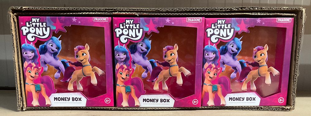 Lot 63: A Trade Carton Containing 12 Boxed My Little Pony Money Boxes