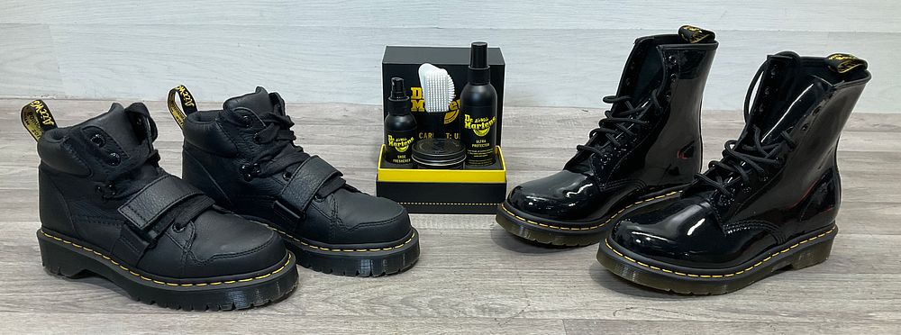 Lot 91: * A Carton Containing 2- Pairs Of Dr. Martens Footwear and Care Kit
