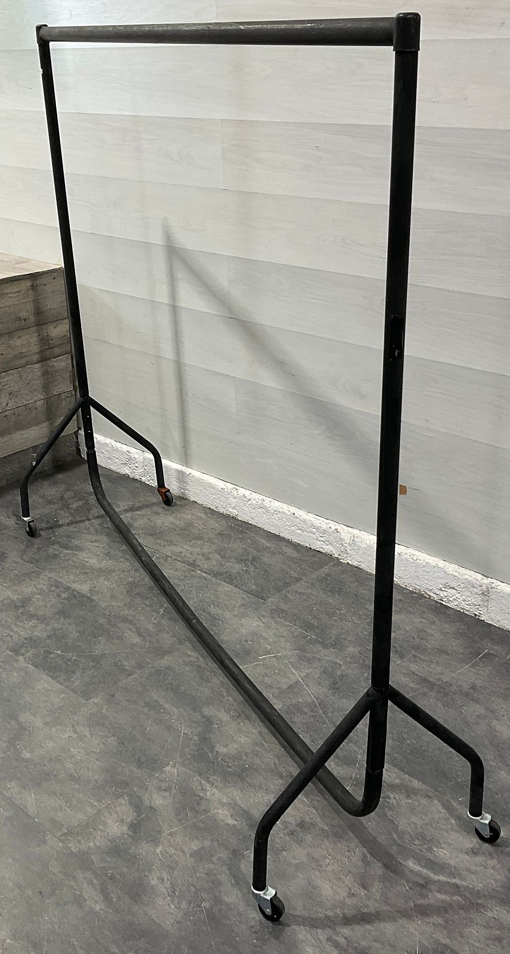 Lot 101: * A Heavy Duty Tubular Steel Garment Rail on Casters