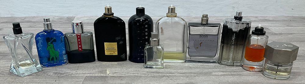 Lot 124: * An Assortment of Part Used Fragrances including Tom Ford Black Orchid and Yves Saint Laurent L’Homme