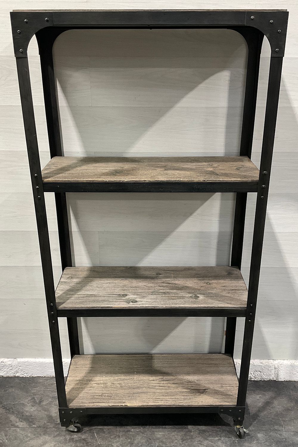 Lot 137: * A Four Tier Industrial Style Open Shelving Unit On Casters