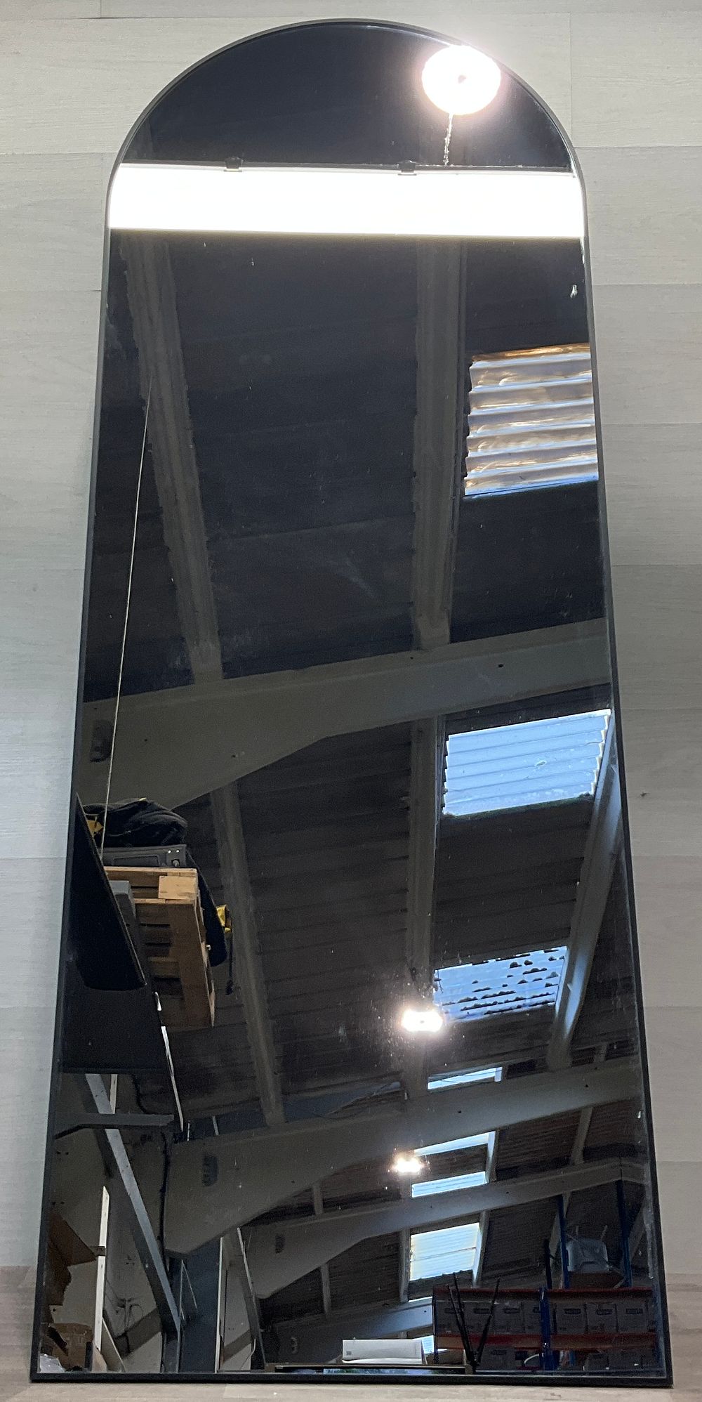 Lot 143: * A Full Length Arched Metal Floor Mirror