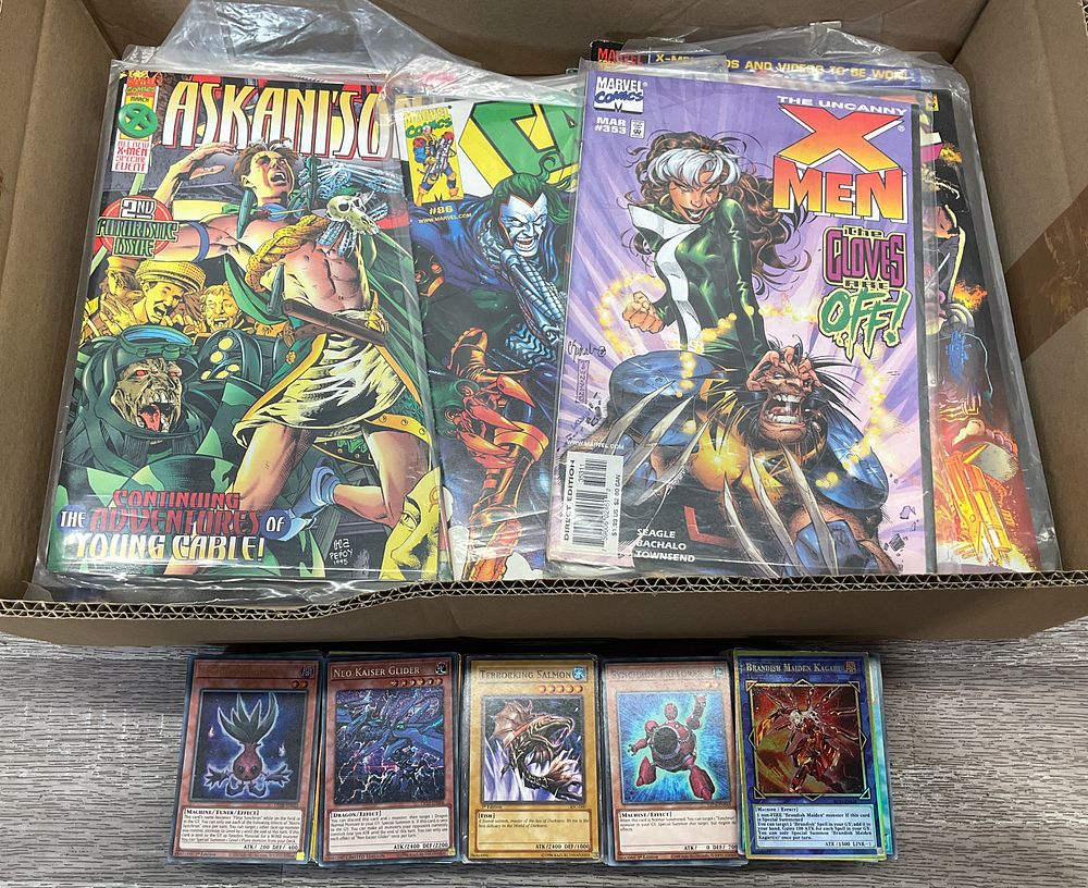 Lot 159: * A Carton Containing Assorted Marvel Comic Books and Yu-Gi-Oh! Trading Cards including Cable Limited Series