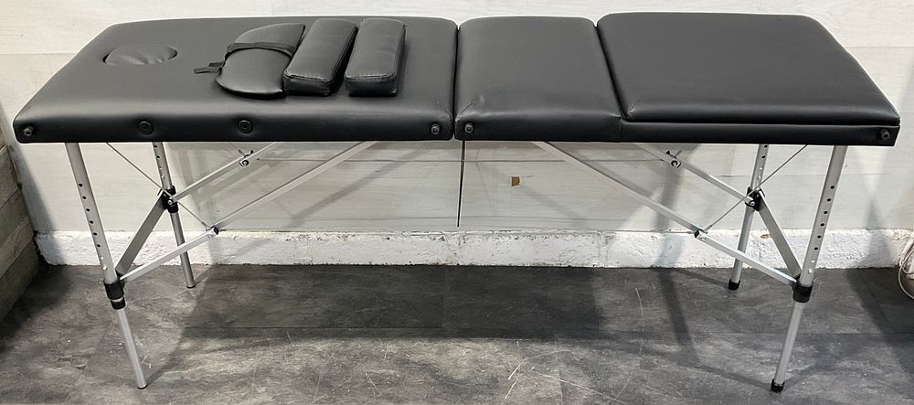 Lot 6: * A Portable Three Section Professional Treatment Table with Accessories and Carrying Case