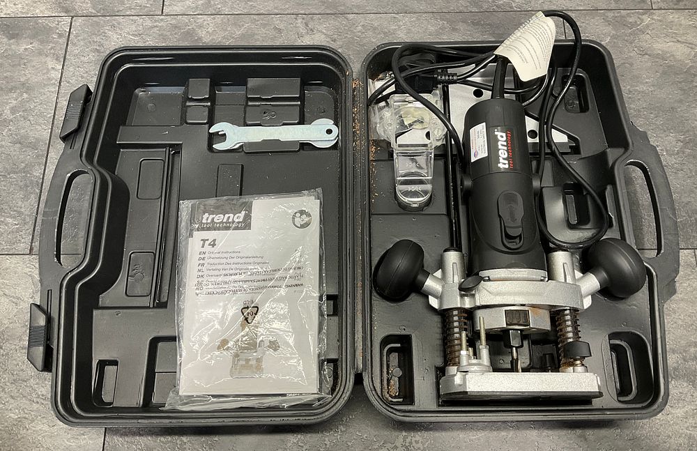 Lot 52: * A Trend T4 Variable Speed Plunge Router with Case and Manual