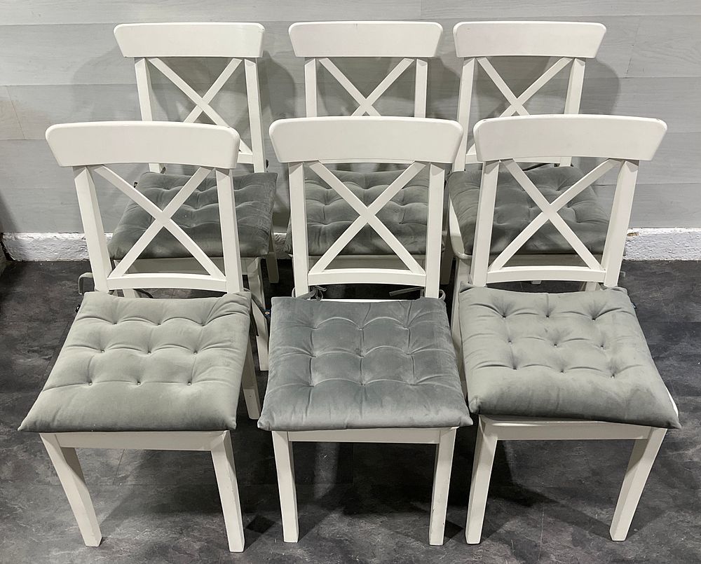 Lot 100: * A Set of IKEA INGOLF White Finished Wooden Dining Chairs with Cushions
