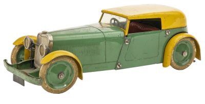 Meccano Coupe. English, Circa 1935, 8.5" L This car has a sleek and streamlined look. 
Condition 
