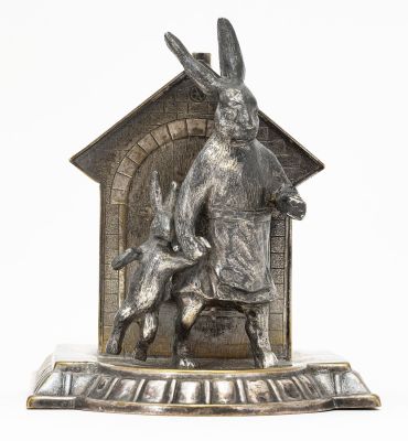 Rabbits by Cottage Bank, WMF. German - 1915 - 4.375" Long. This cute and charming bank is 