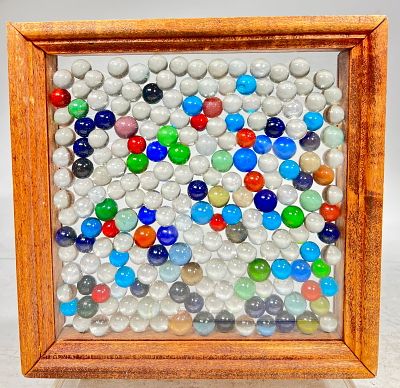 Assorted Machine-Made Marbles In a Frame About 180 in Total. Frame: (9" T x 9" W) Condition: