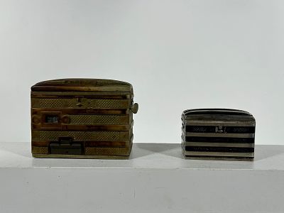 Two Cast Iron Trunk Banks - One by Piaget. American 1910 - From 3 1/2" to 5" L Condition: Fine - 