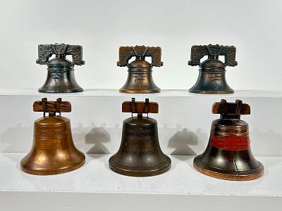 Six Cast Iron or Sheet Tin Liberty Bell Toys. American 1920/30's - Most about 3 1/4" Tall 