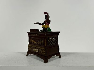 Organ Bank Medium - Cast Iron. Made by Kyser and Rex - Philadelphia 1882 - 6 1/2"T x 4"W x 3"D 