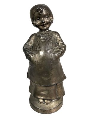 Dutch Girl with Hands in Pockets. Silvered Metal. German - Circa 1930's. Condition: Very Fine 