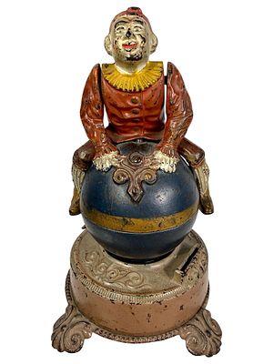 Clown on Globe, Tan Base - Cast Iron Mechanical Bank. J. &amp; E. Stevens Company - Cromwell 