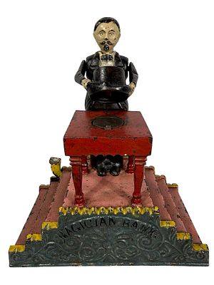 Magician - Cast Iron Mechanical Bank. J. &amp; E. Stevens Company - Cromwell, CT. 1890. 8" Tall 
