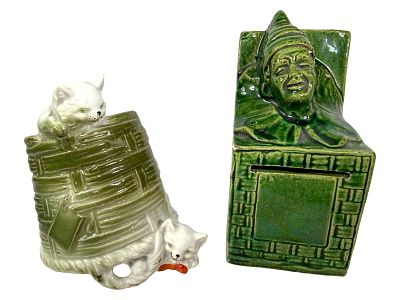 Two Porcelain Banks. Austrian 1910's. Taller is 4 5/8" Tall x 2" Wide x 2" Deep. The Peirce 