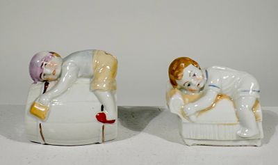 Two Ceramic Banks. Austrian 1910 - Larger is 2 1/2"T x 2 1/2"L - The Peirce Collection 