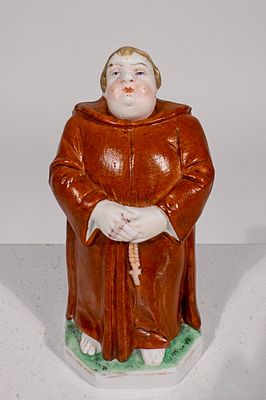 The Bisque Monk Bank. Austrian 1910 - 4 1/2"T x 2"W - The Peirce Collection Condition: Pristine
