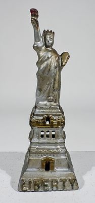 Statue of Liberty Bank - Middle Size Version. Kenton Hardware - Kenton, OH. 1915 - 6 1/4"T x 2 