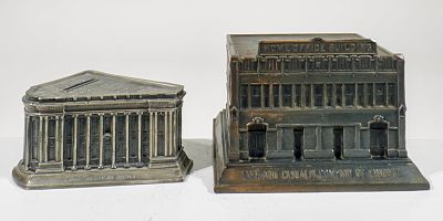 Two Building Still Banks. A.C. Rehberger Co. - Chicago, IL. 1920/30's - Larger is 3 3/4"T x 5 