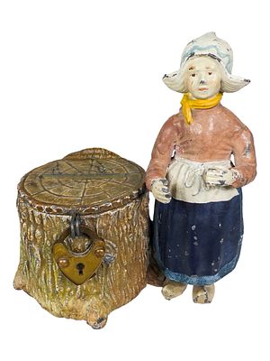 Dutch Girl Beside Tree Stump. Very Rare Unrecorded Example. Germany - 1910's. 3 1/4" Tall x 3" 