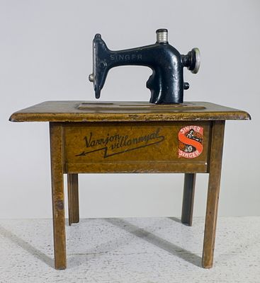 Singer Sewing Machine Bank. German 1930's. 5 1/4" Tall x 4 1/2" Wide. Clayton Luther Collection. 