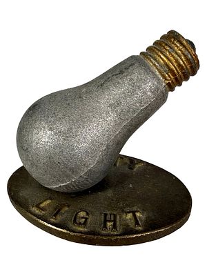 City Light - Advertising Paperweight. Made of an Alloy Material. American - Circa 1930's. 2 3/8" 