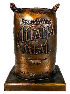Pecos Valley Alfalfa Meal - Advertising Paperweight. Made of Coppered Lead. American - Circa 