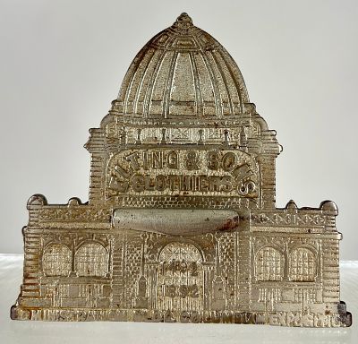 Columbian Magic Savings Bank - Advertises for Elting and Sons Clothiers. By Magic Introduction 