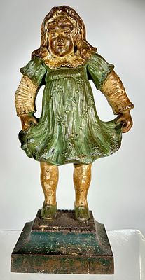 Girl Holding Dress Cast Iron Doorstop - Scarce. Bradley and Hubbard Co. - Connecticut 1920 - 