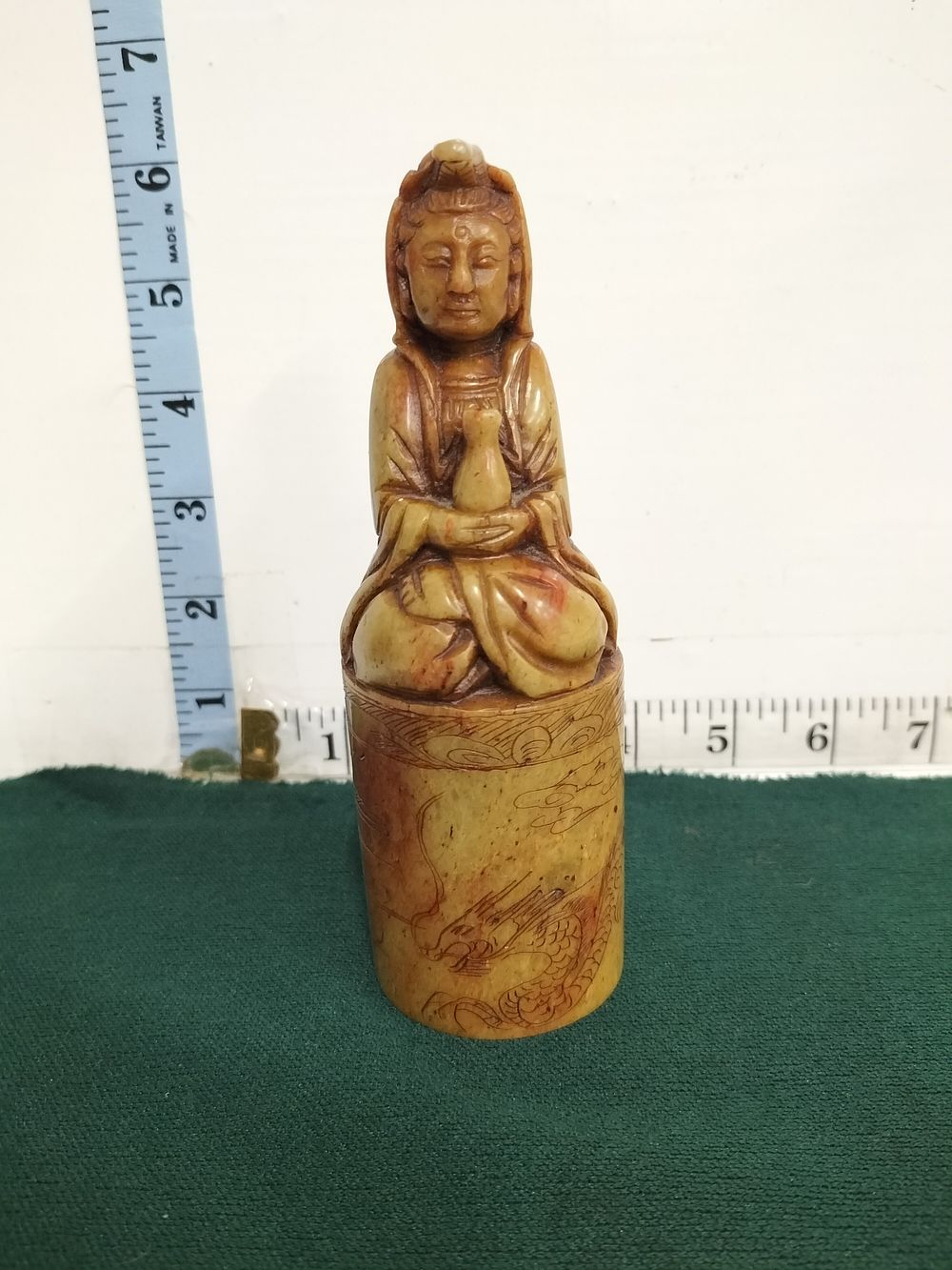 Lot 192 – A Chinese carved soapstone seal, Late Qing Dynasty to Republic Period, Guanyin finial and incised dragon decoration