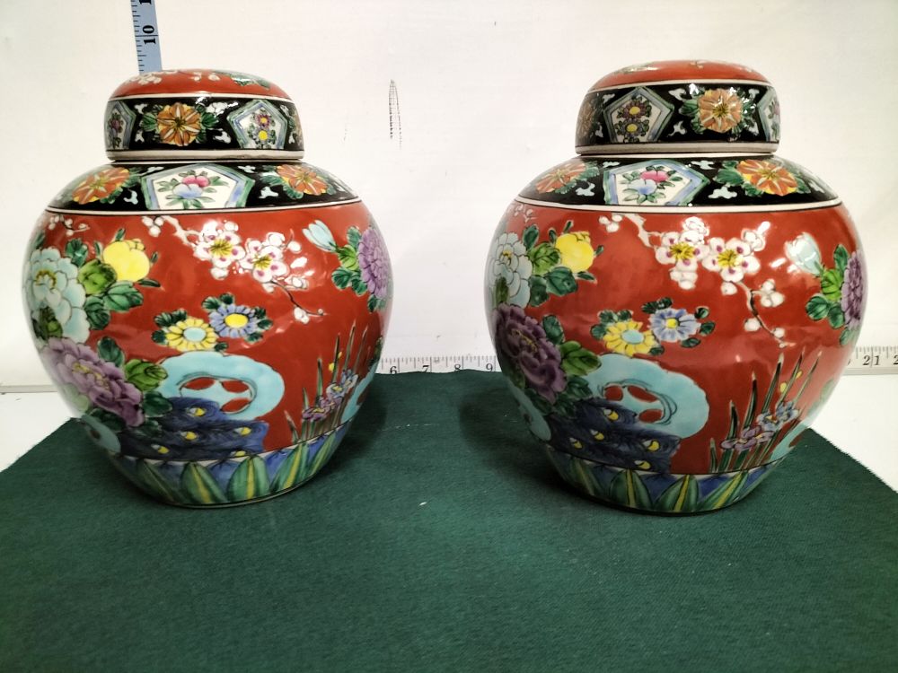 Lot 218 – A Pair of Japanese Red Ground Floral Ginger Jars