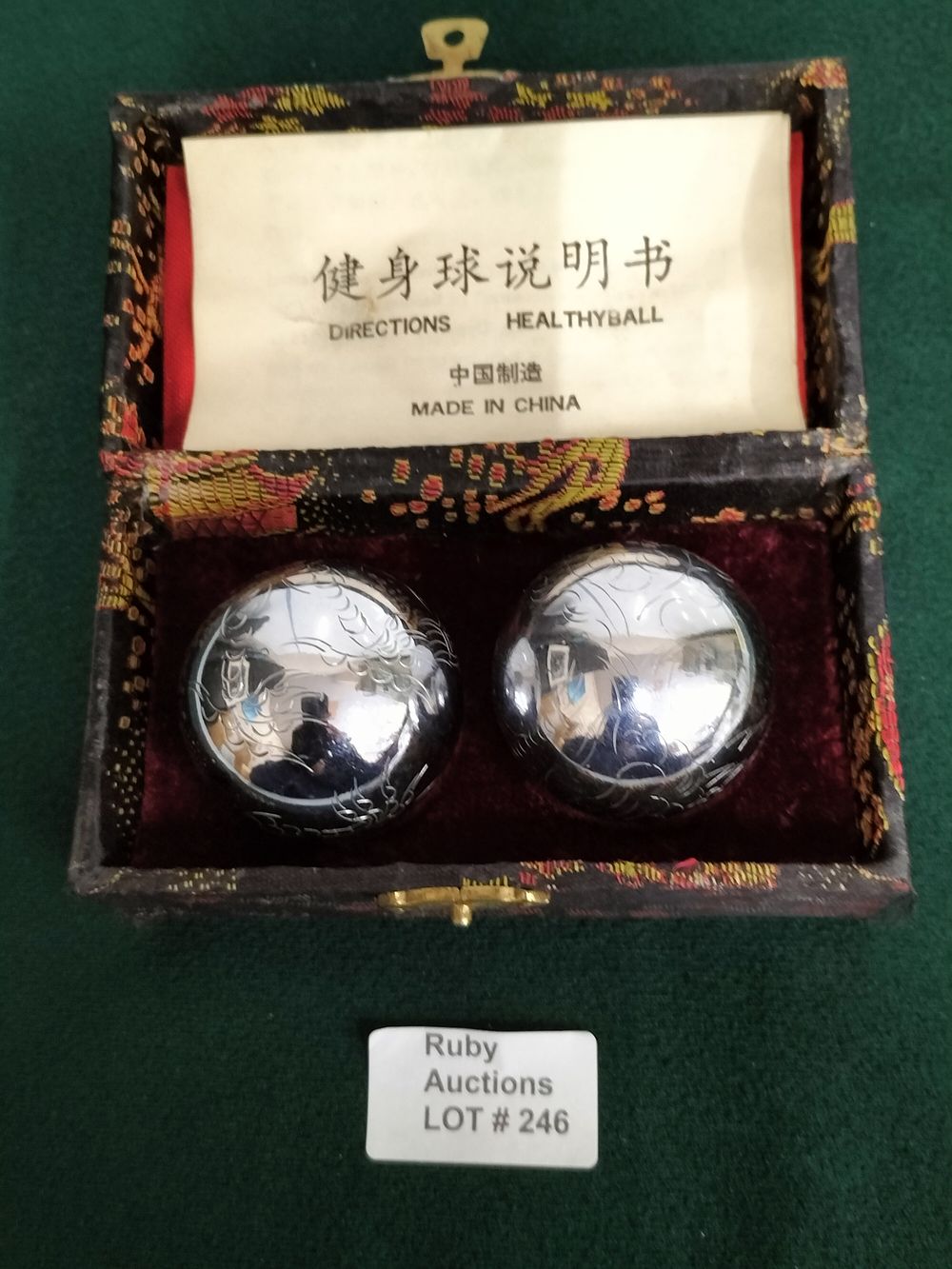 Lot 246 – A Pair of Chinese Etched Silver Toned Baoding Balls