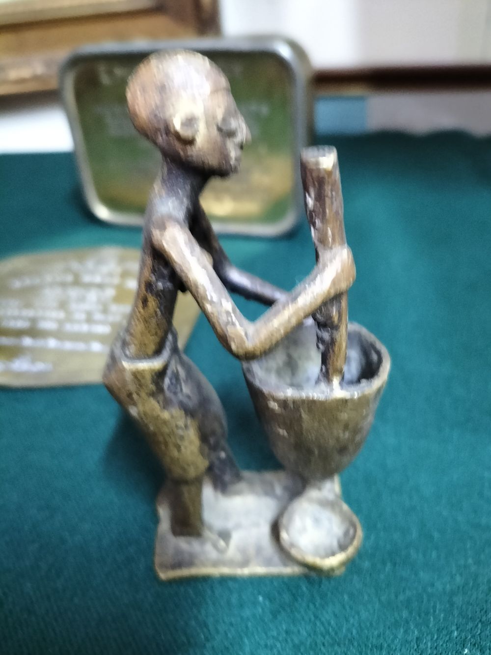 Lot 159 – An Akan Ashanti Bronze Depicting a Figure Pounding Grain