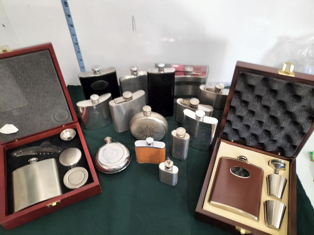 Lot 167 – A Collection of Stainless Steel and Pewter Hip Flasks and Presentation Gift Sets