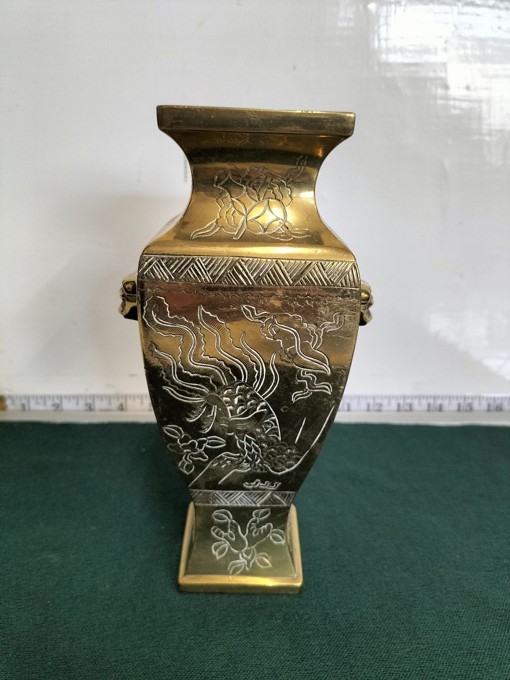 Lot 195 – A Chinese Incised polished Bronze Square-Sectioned Baluster Vase, 20th Century