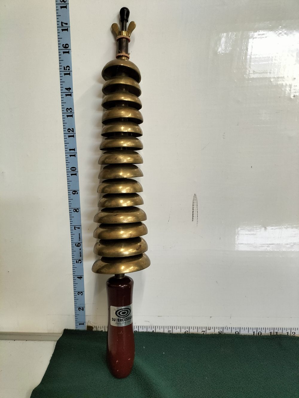 Lot 212 – A Supercussion Handheld 14-Bell Brass Bell Tree