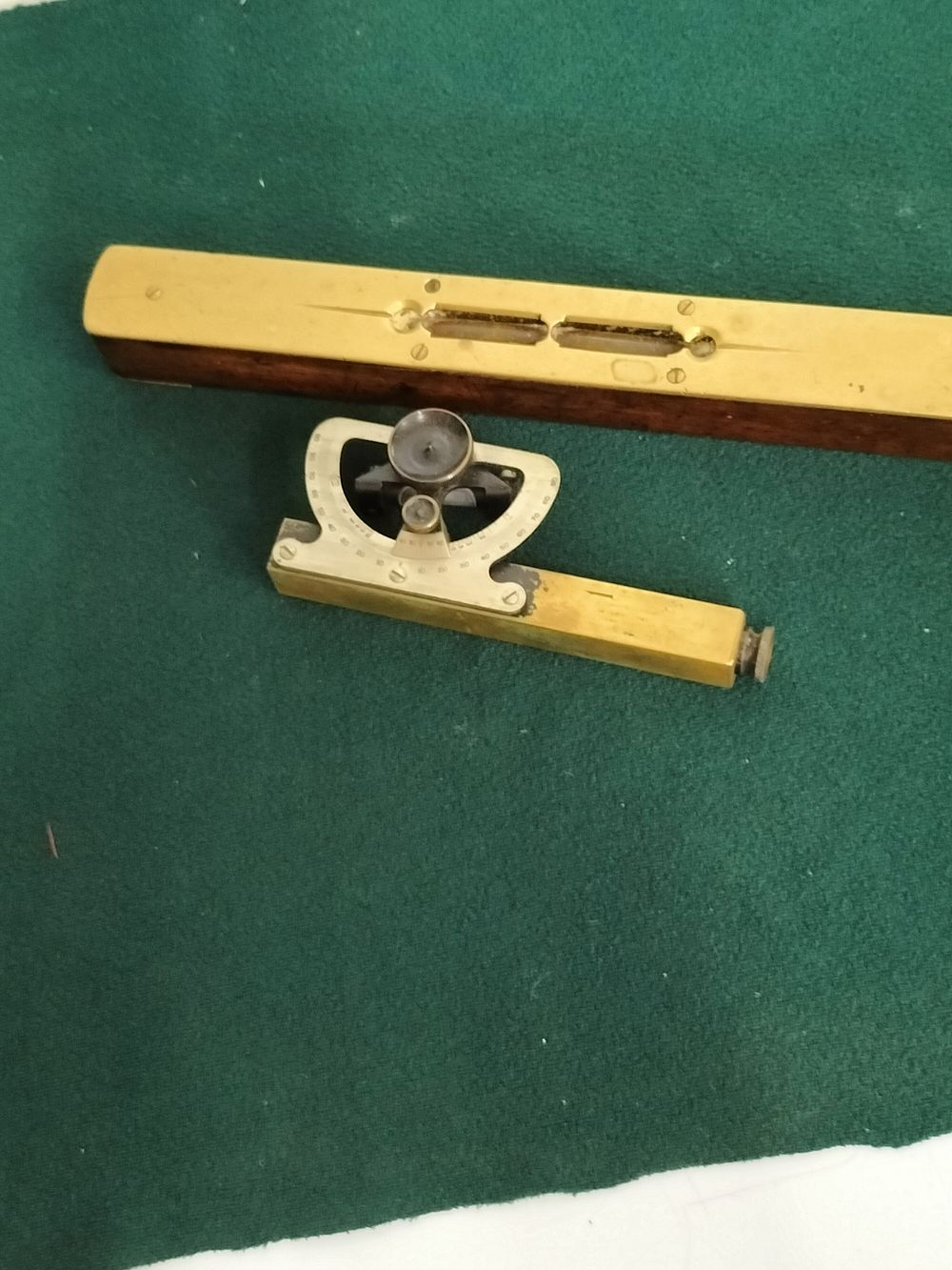 Lot 216 – Two Victorian or Edwardian brass surveying and engineering instruments including a J. Casartelli and Son Abney level