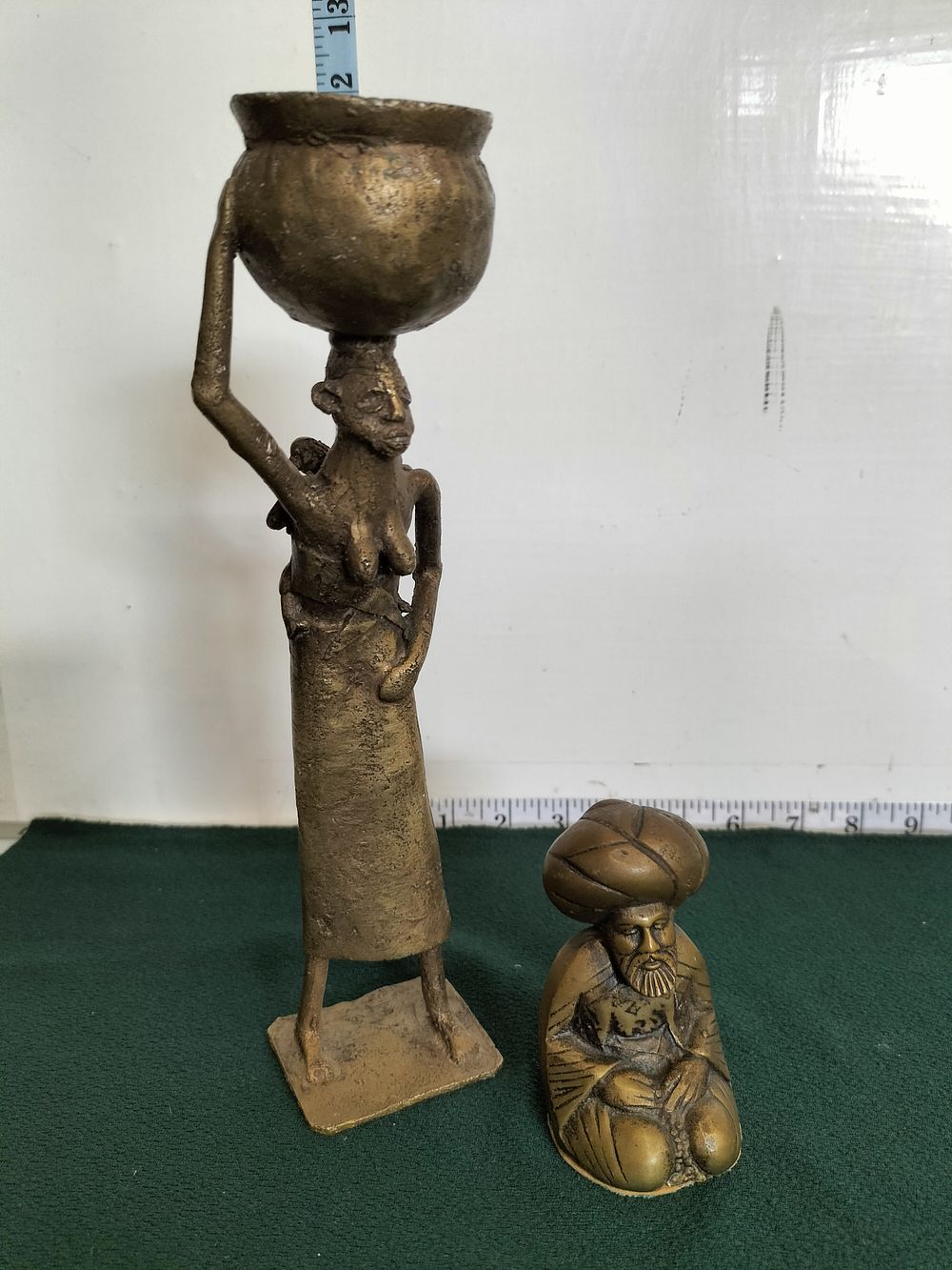 Lot 218 – Two Figures including a West African Style Figural Vessel Holder and an Orientalist Style Kneeling Man in Bronze
