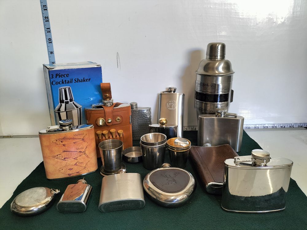 Lot 240 – A Collection of Stainless Steel Hip Flasks and Barware Accessories