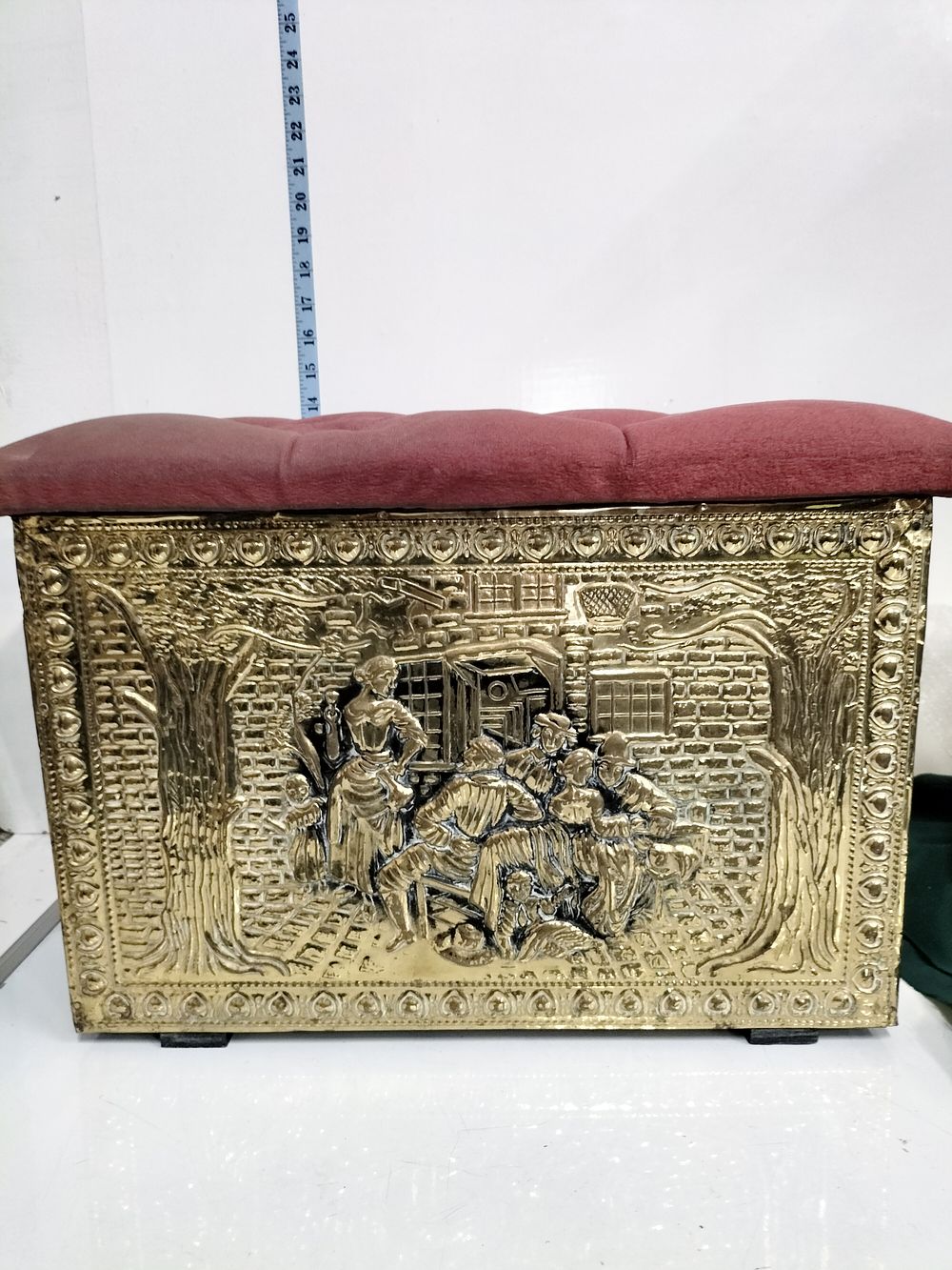 Lot 288 – A mid-20th-century embossed brass-clad log box with upholstered seat