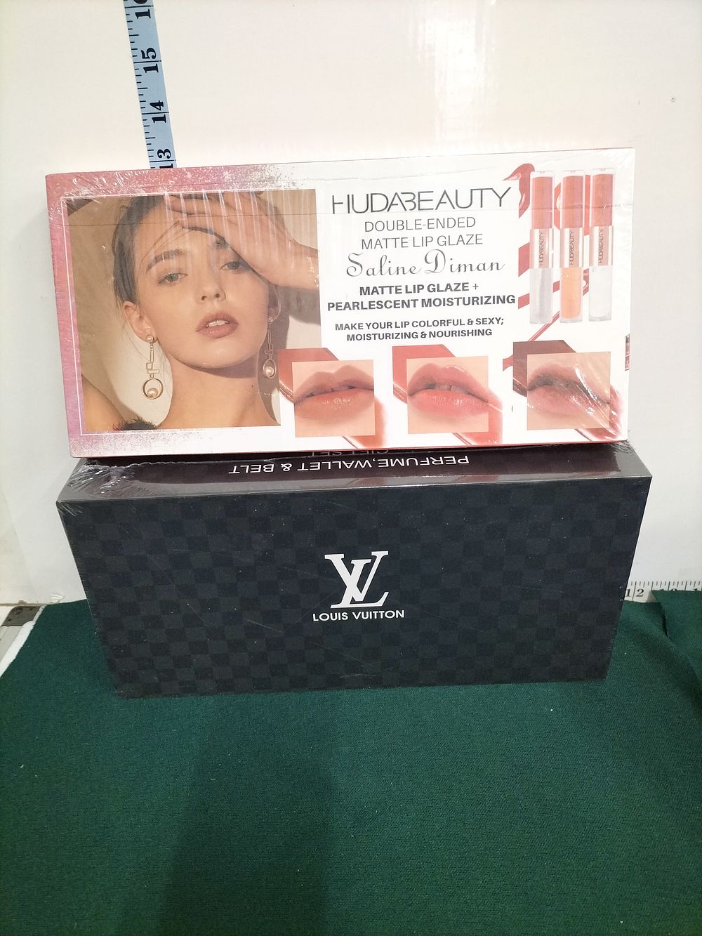 Lot 292 – Two Gift Sets comprising a Lip Glaze Trio and a Louis Vuitton Fashion Accessory Set