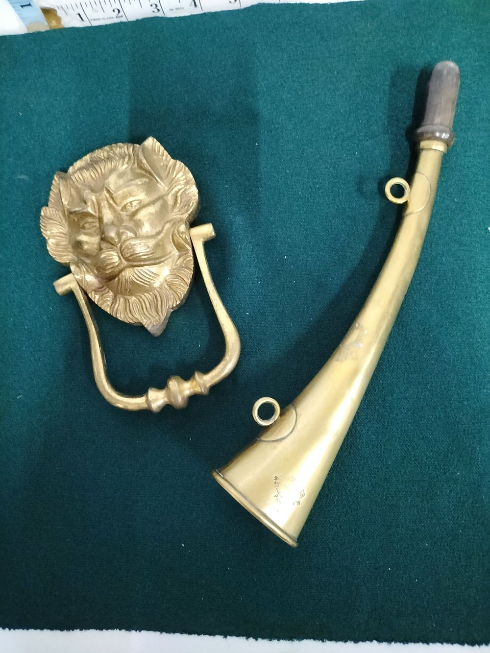 Lot 294 – Two Brass Items Comprising a French Horn by J. Tournier and a Lion Mask Door Knocker